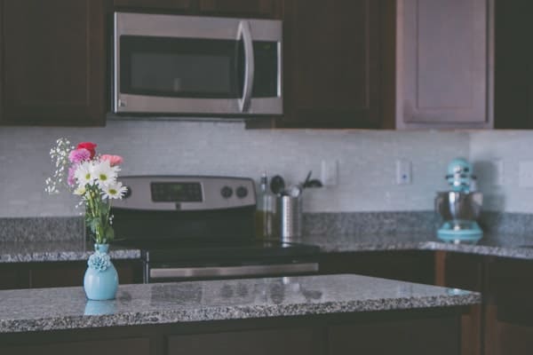 kitchen with microwave on drawer